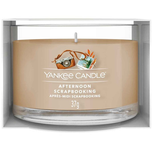 „Yankee Cirle“ popietinis albumų kūrimas (popietę virš nuotraukų albumo)